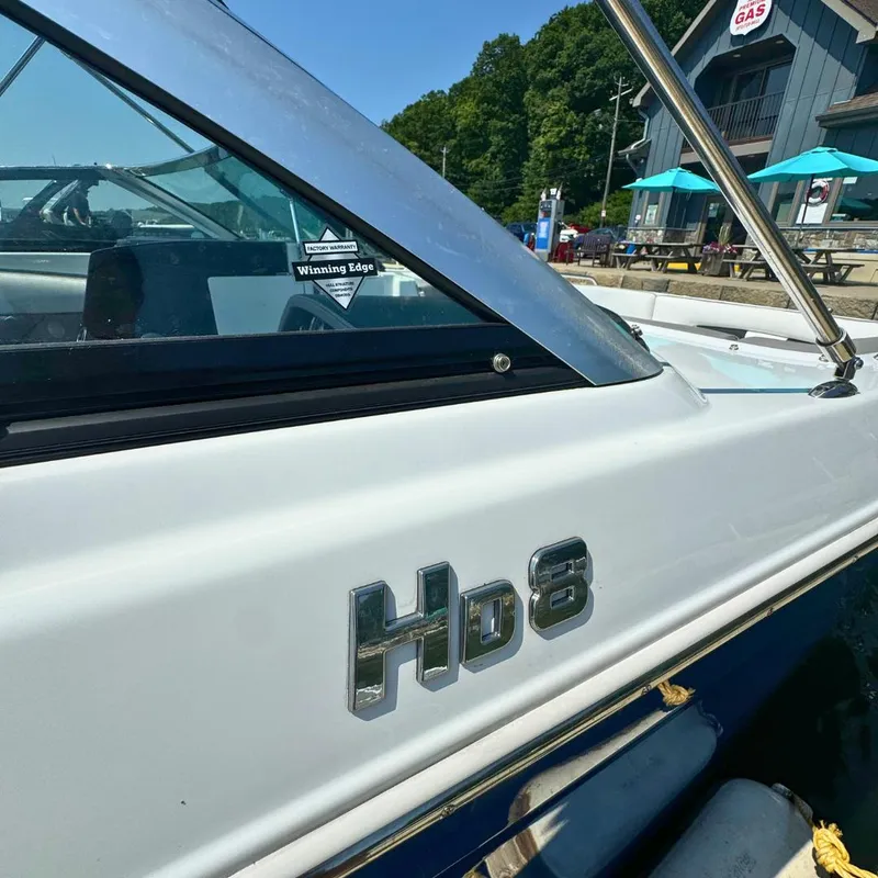 Slide: The Image of 2021 Four Winns HD8 boat stern with swim platform and seating. - 12