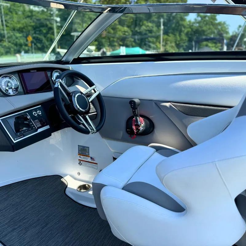 Slide: The Image of 2021 Four Winns HD8 boat interior with spacious seating and modern design. - 4