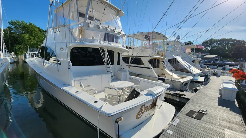 Slide: The Image of 2001 Ocean Yachts 56 Super Sport docked at marina, sunny day. - 3