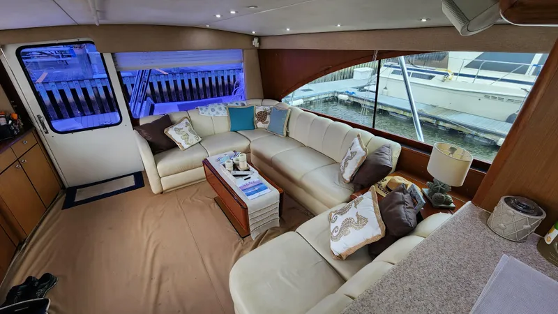 Slide: The Image of Luxurious interior of 2001 Ocean Yachts 56 Super Sport with plush seating and elegant decor. - 42