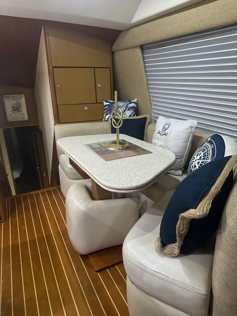 Slide: The Image of Interior of 2001 Ocean Yachts 56 Super Sport with elegant seating and nautical decor. - 45
