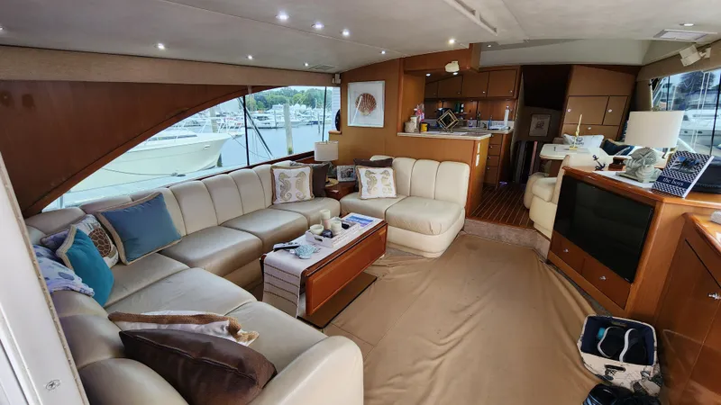 Slide: The Image of Luxurious interior of 2001 Ocean Yachts 56 Super Sport with plush seating and elegant decor. - 40