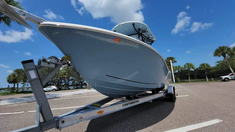 Slide: The Image of 2017 Sea Chaser 24 HFC boat on trailer under blue sky. - 10