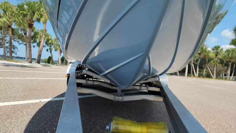 Slide: The Image of 2017 Sea Chaser 24 HFC boat on trailer, close-up of hull and roller. - 15