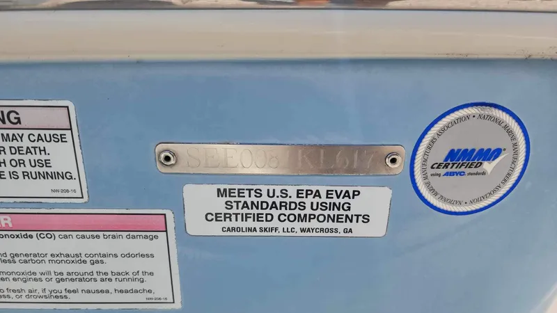 Slide: The Image of 2017 Sea Chaser 24 HFC boat compliance and safety labels. - 23