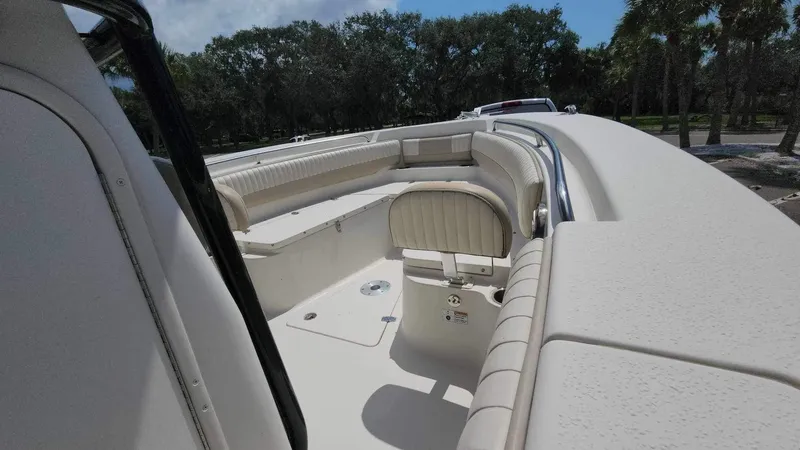 Slide: The Image of 2017 Sea Chaser 24 HFC boat interior with cushioned seating and storage compartments. - 34