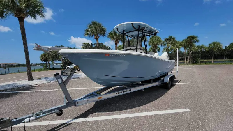 Slide: The Image of 2017 Sea Chaser 24 HFC boat on a trailer in a sunny parking lot. - 39