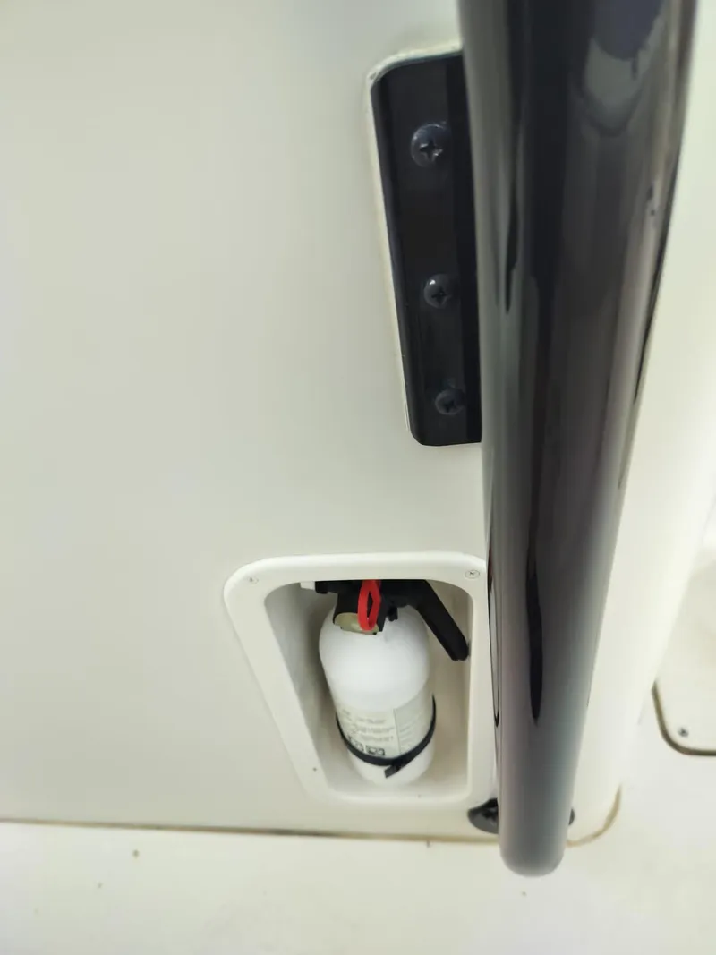 Slide: The Image of 2017 Sea Chaser 24 HFC boat detail with mounted fire extinguisher. - 42