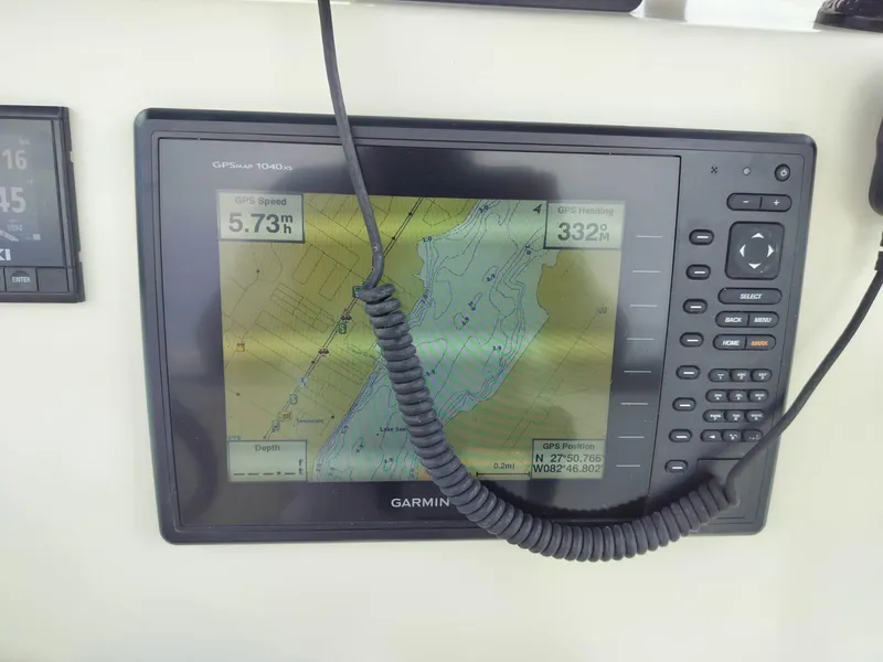 Slide: The Image of Garmin GPS display on 2017 Sea Chaser 24 HFC boat dashboard. - 44
