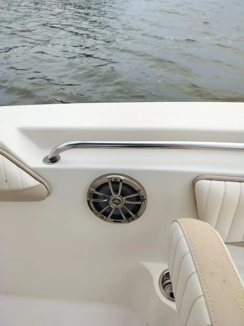 Slide: The Image of 2017 Sea Chaser 24 HFC boat interior with speaker and water view. - 47