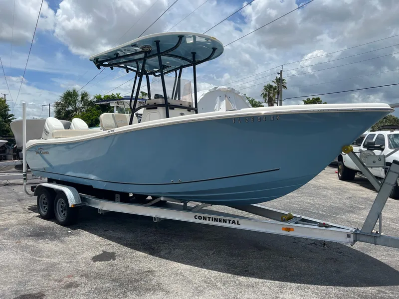 Slide: The Image of 2017 Sea Chaser 24 HFC boat on Continental trailer under cloudy sky. - 8