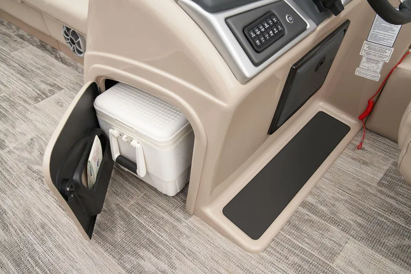 Slide: The Image of 2024 Ranger Reata 220FC boat interior storage compartment with cooler. - 26