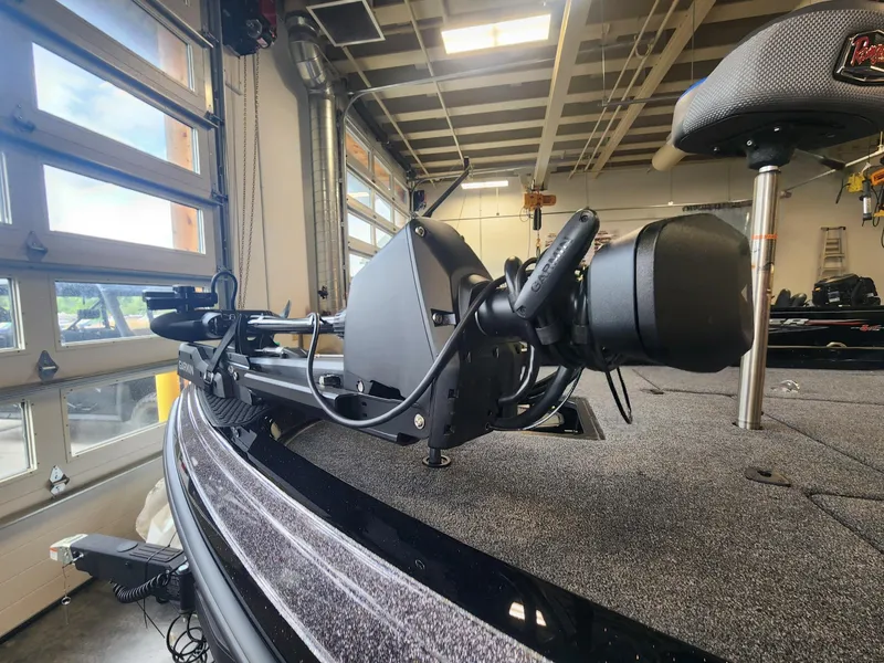 Slide: The Image of 2024 Ranger Z519 boat with advanced trolling motor in a garage. - 3