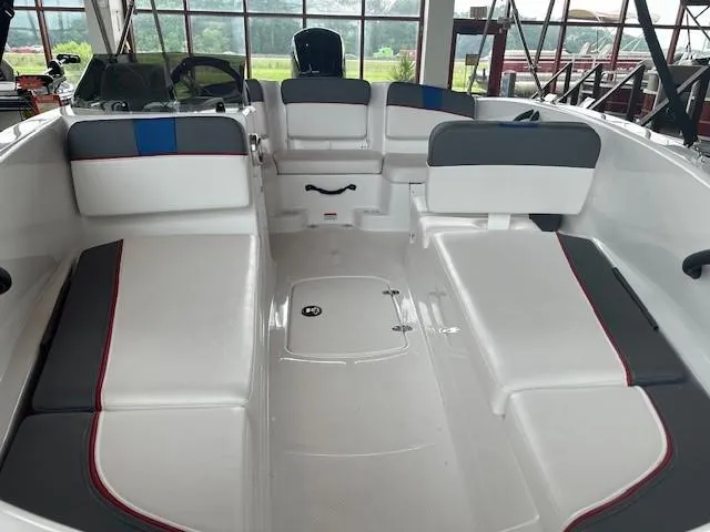 Slide: The Image of 2024 Tahoe T16 boat interior with white and gray seating. - 3