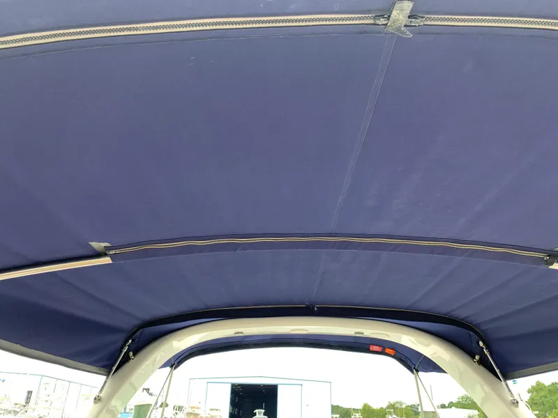 Slide: The Image of 2006 Sea Ray 340 Sundancer boat canopy, navy blue fabric. - 10