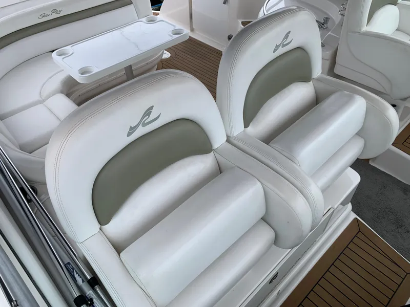 Slide: The Image of Luxury seating on 2006 Sea Ray 340 Sundancer boat with white and beige upholstery. - 20