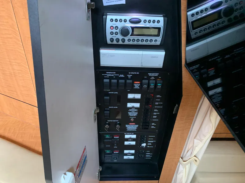 Slide: The Image of Electrical control panel on a 2006 Sea Ray 340 Sundancer boat. - 40