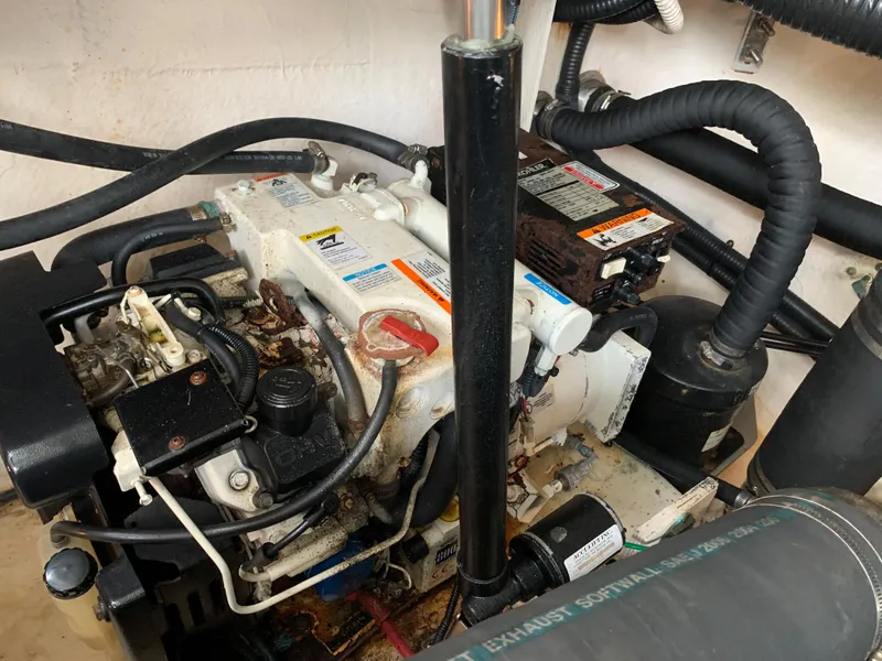 Slide: The Image of Engine compartment of a 2006 Sea Ray 340 Sundancer boat. - 44