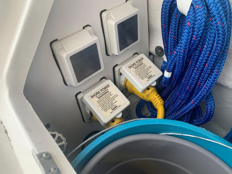 Slide: The Image of Shore power connections on a 2006 Sea Ray 340 Sundancer boat. - 45