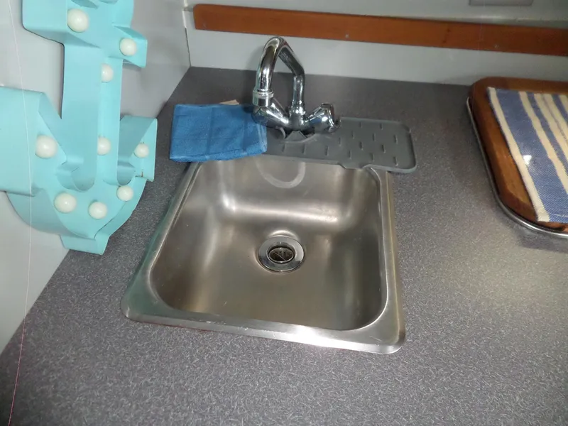 Slide: The Image of Stainless steel sink in 1986 Wellcraft Monte Carlo 2800 boat kitchen. - 42