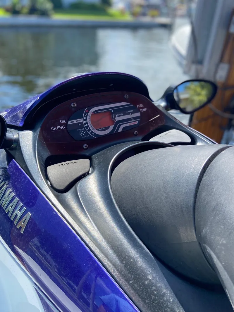 Slide: The Image of Close-up of 2003 Yamaha WaveRunner FX 140 dashboard by the water. - 3