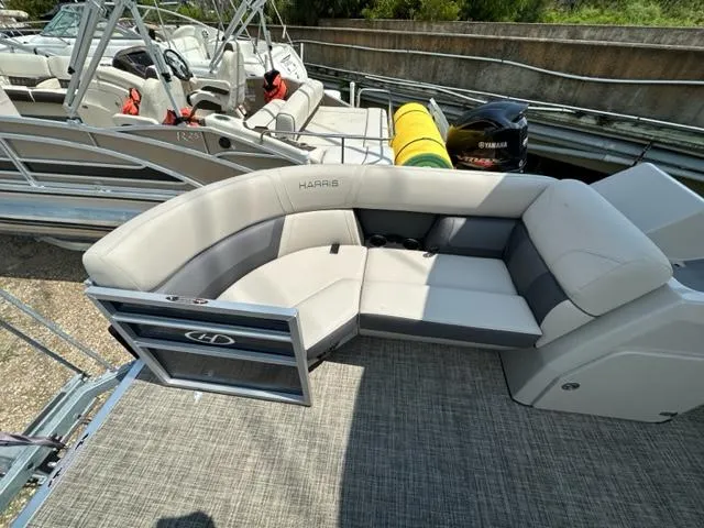 Slide: The Image of 2023 Harris 210 Cruiser boat with comfortable seating and modern design. - 8