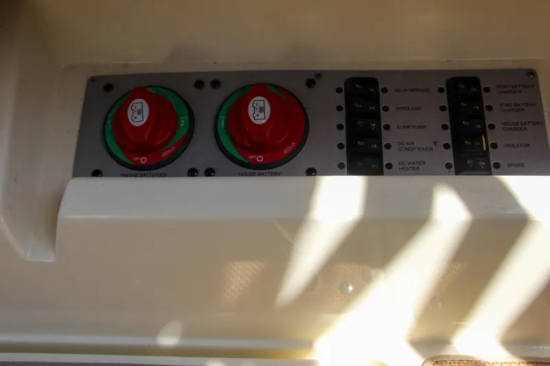 Slide: The Image of Control panel of 2017 Chris-Craft Calypso 30 boat with switches and dials. - 40