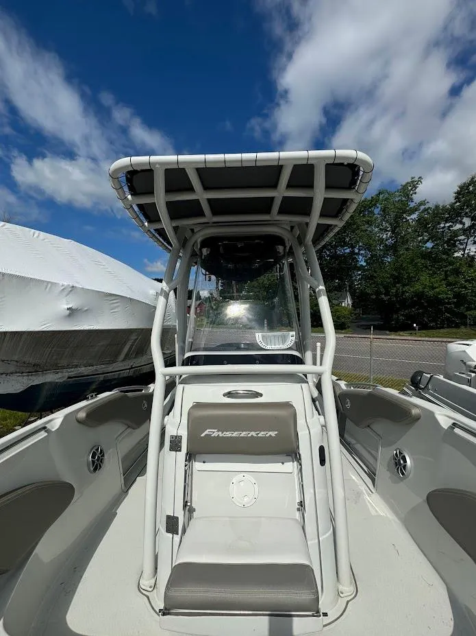 Slide: The Image of 2021 Finseeker 206 CC boat with T-top and center console. - 10