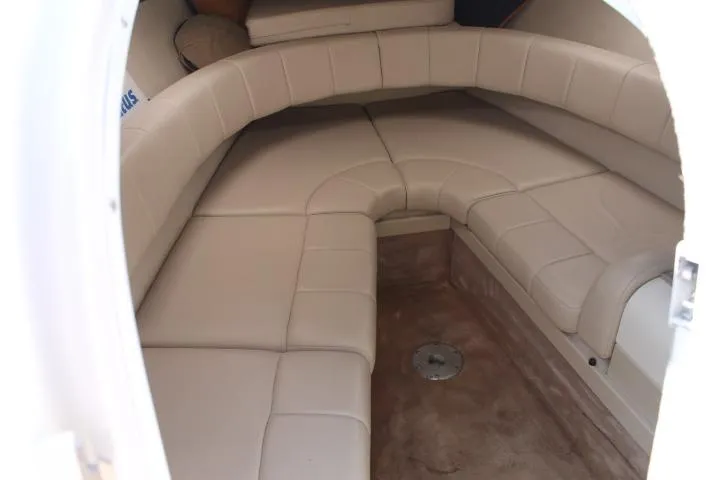 Slide: The Image of 2001 Formula 260 Sun Sport cabin with beige seating and carpeted floor. - 12
