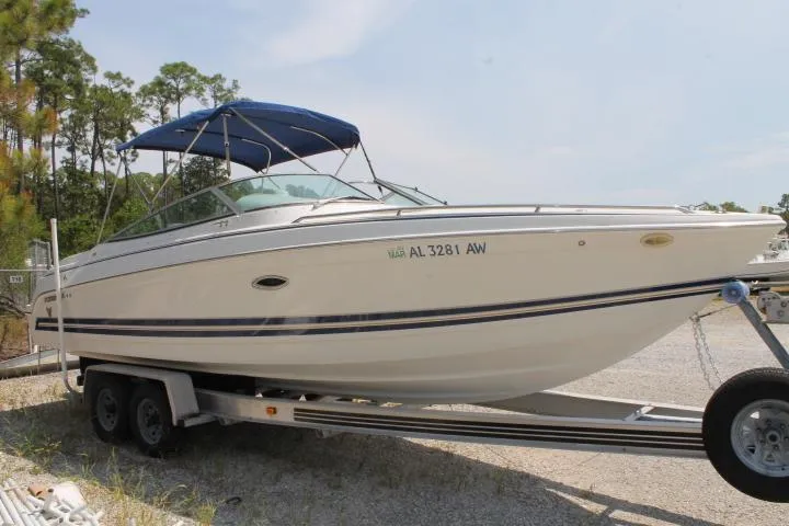 Slide: The Image of 2001 Formula 260 Sun Sport boat on trailer with blue canopy. - 6