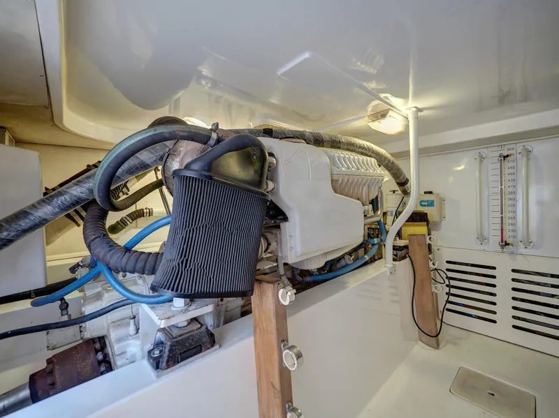 Slide: The Image of Engine room of a 2005 Luhrs 41 Convertible boat. - 33