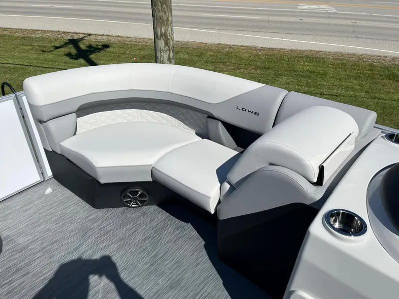 Slide: The Image of 2024 Lowe SS 170 boat with luxurious white and gray seating. - 13