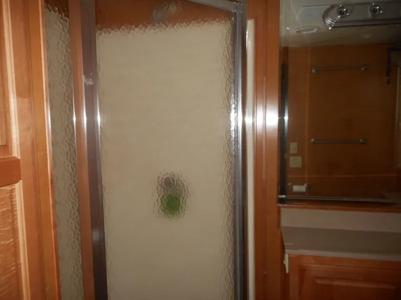 Slide: The Image of Shower with frosted glass door in wooden bathroom, Sharpe Mysterious Waves 2004 model. - 20