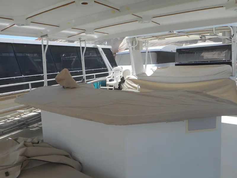 Slide: The Image of Covered deck area on 2004 Sharpe Mysterious Waves houseboat. - 8