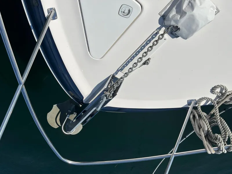 Slide: The Image of 1997 Sea Ray 420 Aft Cabin bow with anchor and chain in water. - 5