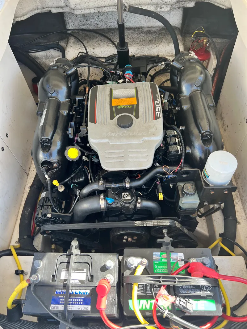 Slide: The Image of Engine compartment of a 2013 Chaparral 246 SSi boat with a 350 MAG engine. - 15