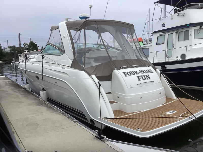 Slide: The Image of 2001 Formula 40 PC yacht docked, named Four-Some Fun. - 1