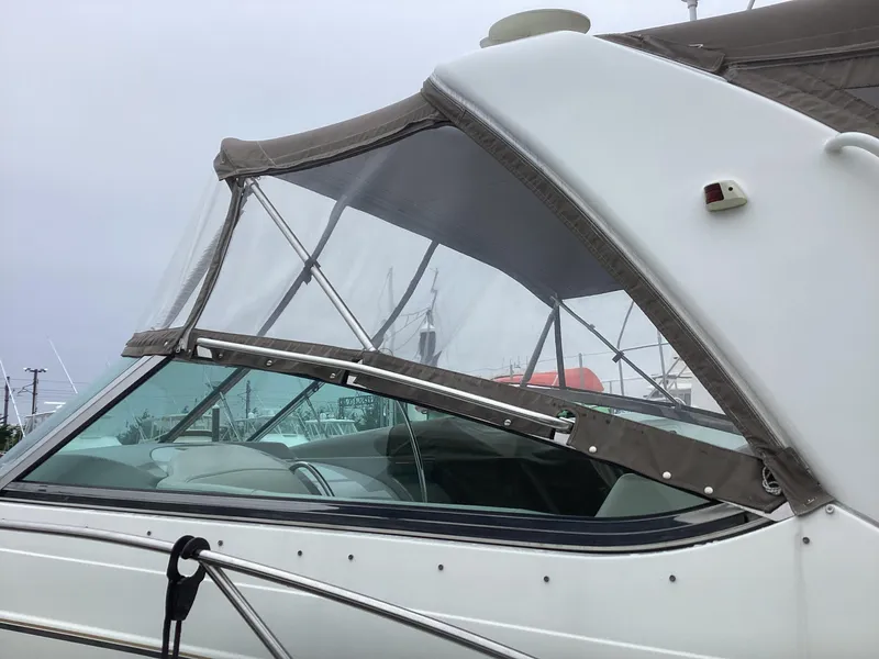 Slide: The Image of 2001 Formula 40 PC boat with canvas cover and clear windows. - 5