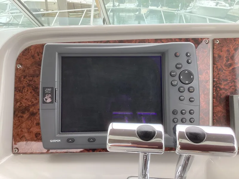 Slide: The Image of Garmin navigation system on a 2001 Formula 40 PC boat dashboard. - 8