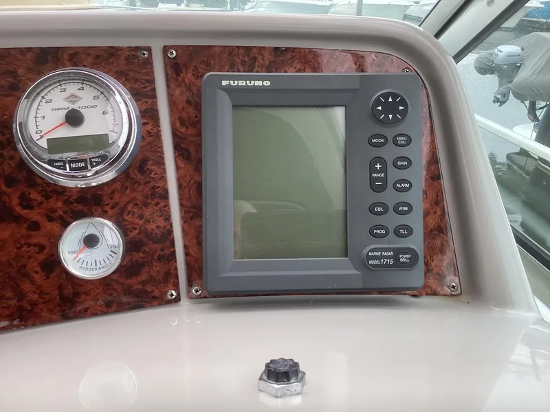 Slide: The Image of Dashboard of a 2001 Formula 40 PC boat with Furuno navigation system. - 9