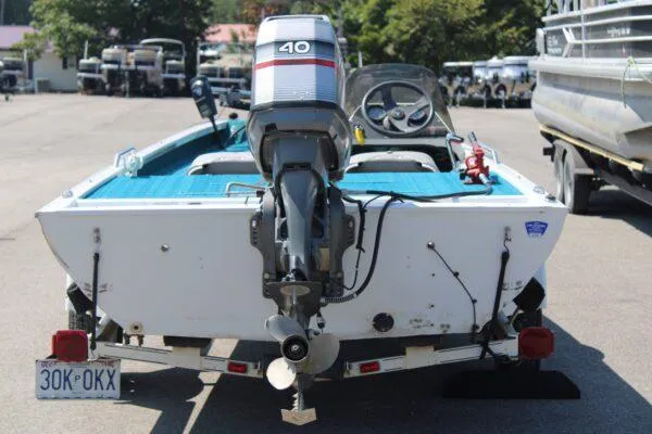 Slide: The Image of 1994 Ranger Cherokee boat with 40 HP outboard motor, rear view. - 15