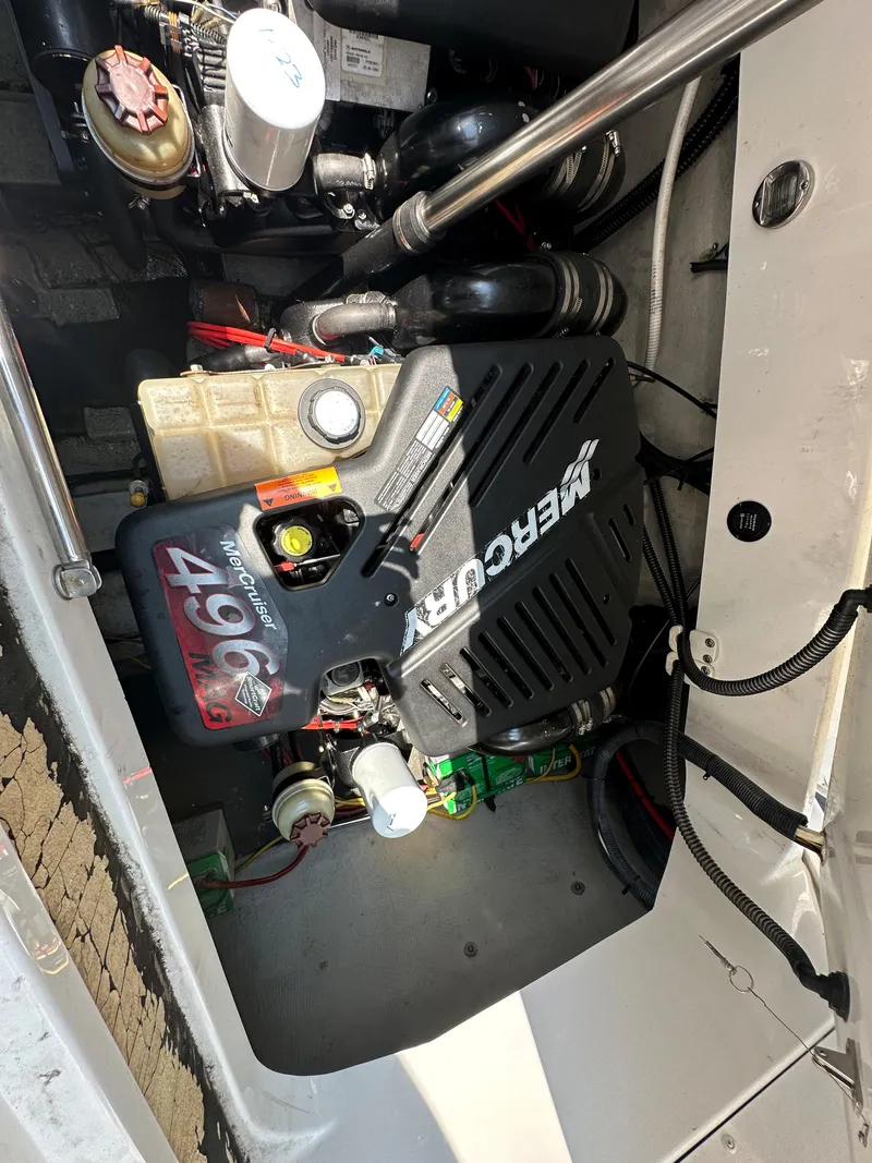 Slide: The Image of 2005 Cobalt 360 Cruiser engine compartment with MerCruiser 496 engine. - 12