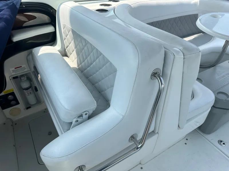 Slide: The Image of 2005 Cobalt 360 Cruiser interior with white leather seating and stainless steel accents. - 4