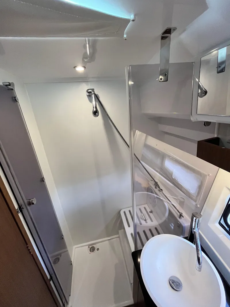 Slide: The Image of 2022 Jeanneau NC 1095 bathroom with modern fixtures and shower. - 22