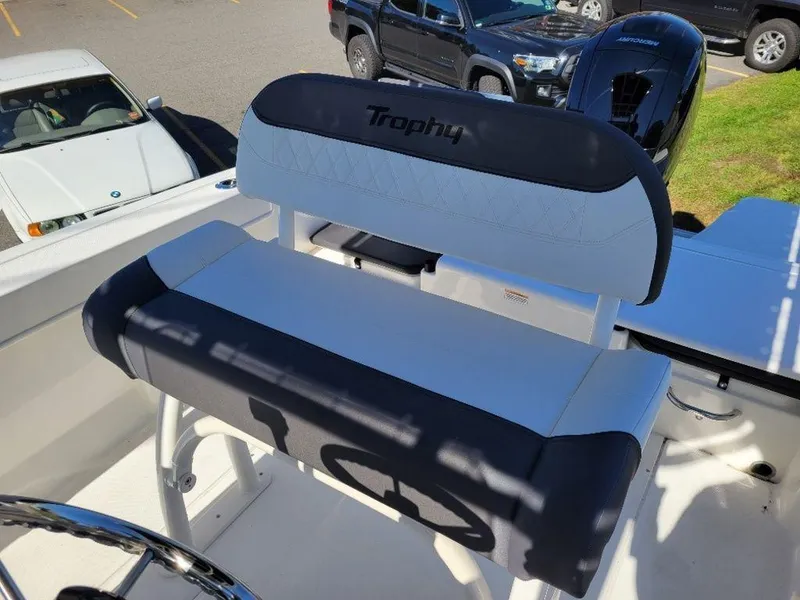 Slide: The Image of 2024 Bayliner Trophy 20 boat seat with Trophy logo, parked in a lot. - 10