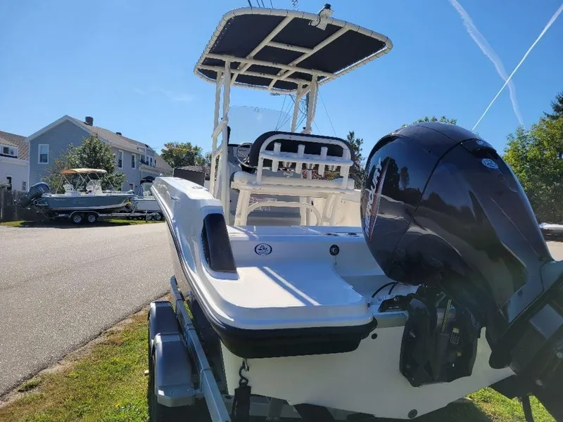 Slide: The Image of 2024 Bayliner Trophy 20 boat with outboard motor on trailer. - 7