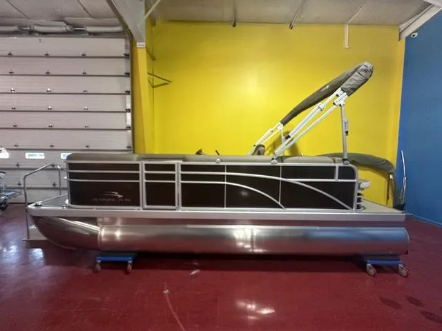 Slide: The Image of 2024 Bennington 198 SLJ pontoon boat in showroom. - 4