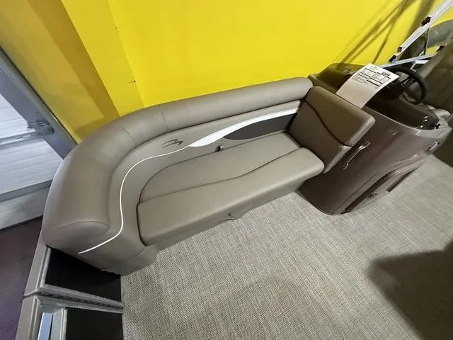 Slide: The Image of 2024 Bennington 198 SLJ boat interior seating with beige upholstery. - 8