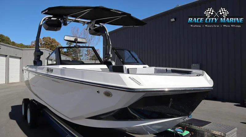 Slide: The Image of 2024 Nautique GS24 boat at Race City Marine dealership. - 27