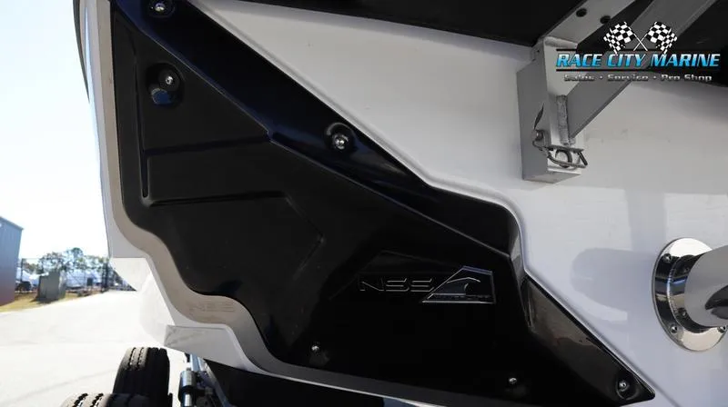 Slide: The Image of Close-up of 2024 Nautique GS24 boat's rear section at Race City Marine. - 34